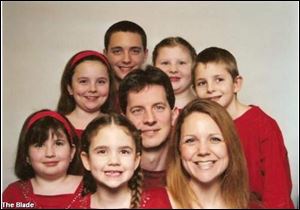 
A family photo shows (clockwise from bottom left), Sidney Griffin, Haley Burkman, Brett Burkman (not in vehicle), Jordan Griffin, Beau Burkman, Bethany Griffin and Lacie Burkman. At center is Danny Griffin, Jr., Haley, Jordan, Bethany, Lacie and Vadie (not pictured) were killed in the crash.
