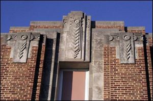 The building is graced with Art Deco adornment. Clay opened in 1926 and was used until the 1950s, when part of the structure became the high school. Clay consisted of 16 classrooms, an auditorium and gym used by the grade school and high school.