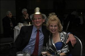 Bob and Janette Yano (cq) listen to Swingmania during their New Year's outing at The Clarion in South Toledo. 