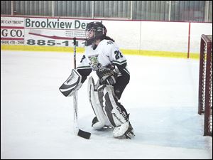Lindsey Roshon faces plenty of shots as goaltender for the Green Bears. She was named MVP at the Martin Luther King tournament as a sophomore.