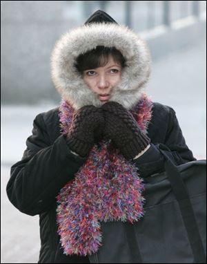 Dorothy Chinnis-Miller of Perrysburg is bundled up for errands in downtown Toledo.