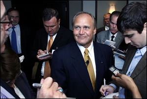 Robert Nardelli was mobbed by reporters at an appearance in Detroit a month after taking over as head of Chrysler LLC.