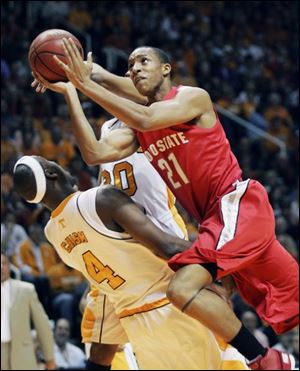 Ohio State's Evan Turner, who led the Buckeyes with 21 points and 10 rebounds, goes into Tennessee's Wayne Chism for a shot.