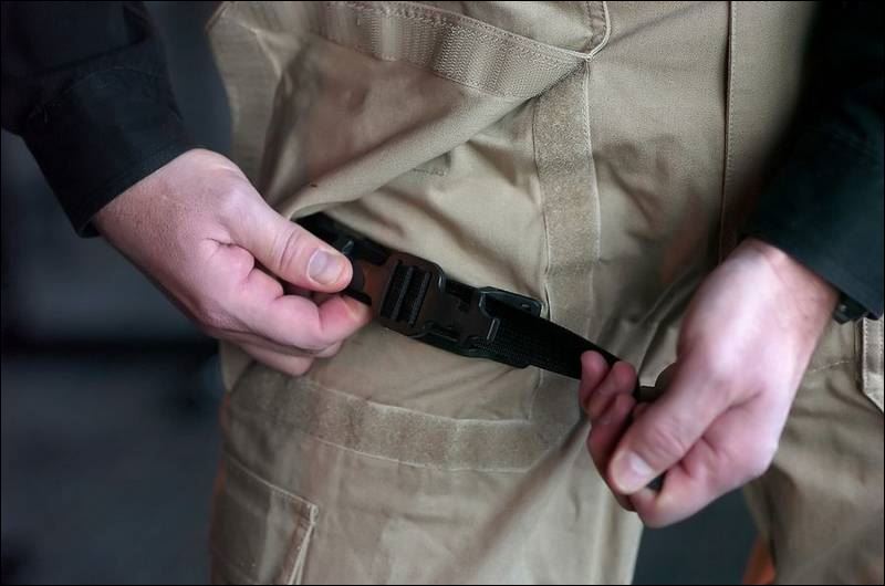 ExArmy surgeon inserts tourniquets in military uniform Toledo Blade