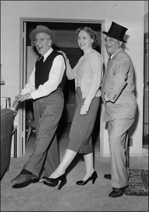 Margaret Truman keeps in step with comedian Jimmy Durante, left, and his partner, Eddie Jackson, as they rehearse a bit in March, 1952.