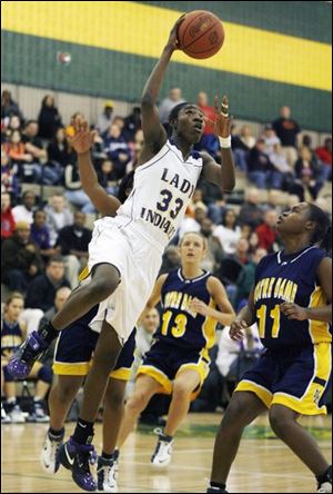 Waite s Natasha Howard glides in for two of her 28 points last
night at Start where the Indians defeated Notre Dame in a City
League semifi nal. Waite plays Central in Saturday s final. (THE BLADE/JEREMY WADSWORTH)
<br>
<img src=http://www.toledoblade.com/assets/gif/TO17150419.GIF> VIEW: <a href=