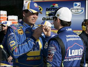 Daytona 500 polesitter Jimmie Johnson, right, qualified at 187.075 mph. Michael Waltrip locked in the runner-up spot alongside Johnson with a 186.734 clocking.