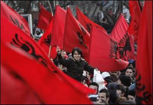 Kosovars celebrate the proclamation of Independence in Kosovo's capital Pristina on Sunday. Kosovo's ethnic Albanian leadership called a special session of parliament Sunday to declare independence a bold and historic bid for statehood in defiance of Serbia and Russia.