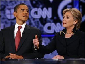 Sen. Hillary Rodham Clinton and Sen. Barack Obama debate Thursday in Austin. (ASSOCIATED PRESS)
<br>
<img src=http://www.toledoblade.com/assets/gif/weblink_icon.gif> <b><font color=red>ALSO: </b></font color=red> <a href=" /apps/pbcs.dll/article?AID=/20080222/NEWS09/802220346" target="_blank "><b>In Toledo, McCain says allegations 'not true'</b></a><br>