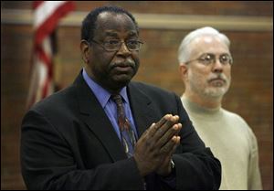 Tyrone Sturdivant, left, and Steven Flagg answer questions during the Urban Coalition's press conference announcing the group's opposition to the Toledo Public Schools' levy. The levy, which was passed in 2000 and renewed in 2003, is up for renewal in the March 4 primary election.
