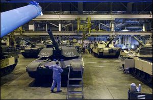 The plant upgrades tanks to M1A2s. 