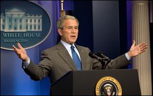 President Bush answers questions from reporters during a news conference at the White House in Washington, Thursday. (ASSOCIATED PRESS)
<br>
<img src=http://www.toledoblade.com/graphics/icons/video.gif> <b><font color=red>AP VIDEO</b></font color=red>: <a href=