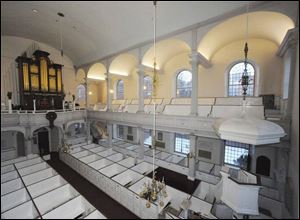 Boston's Old North Church goes high-tech with the installation of LEDs to illuminate its ceiling vaults. The 285-year-old church was used by Paul Revere to signal British troop movements.