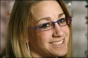 Courtney Hummel, 18, in two-tone Bellagio glasses.