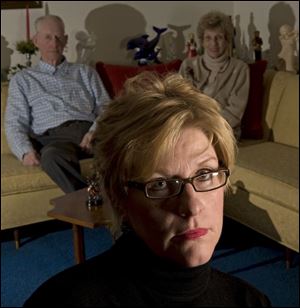 Jo Ann Bauer, 52, has moved back in with her parents, Bill and Shirley Smith.