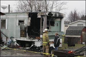 Ada-Liberty Township Fire Chief Jay Epley said firefighters arrived to find 20-foot-high flames shooting from the laundry room of the home rented by the Farkasdi family. The victims were found in the bedrooms and nearby hallway and are believed to have died from smoke inhalation. There were no working smoke detectors at the scene of the blaze, which was ruled accidental.