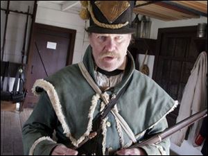 nbrw history10 4/5/2008 blade photo by herral long   Tony Szymanski of holland oh expalins his flintlock   _____________ Hands on History Saturday at Fort Meigs ? April 5, 2008 After a long winter, Fort Meigs? gates are re-opened. Help us kick-off the 2008 season with a ?bang? as we present A Soldier?s Life, a Hands-on History Saturday program on Saturday, April 5. Witness musket demonstrations and learn about the life of a soldier or camp follower during the War of 1812 by experiencing the activities that soldiers performed on a daily basis like laundry, drilling with the musket, and marching. The program runs from 1:00 - 4:00 p.m. and all activities are included with paid admission. Fort Meigs is open Wednesday through Saturday from 9:30 am to 5:00 pm and Sundays Noon to 5:00 pm. Admission is $7- Adults; $6- Seniors, $3- Students; Free- Five and under. Fort Meigs, one of 60 Ohio Historical Society sites, is located one mile west of Perrysburg, Ohio on State Route 65. For further information call the fort at 800-283-8916 or visit us on-line at www.fortmeigs.org