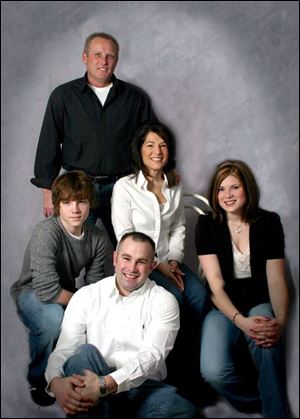 The Donahue family portrait: Background, the father, Dennis, now deceased; mother, Karen, center, and from left, children Blake, Brandon, and Taryn.
