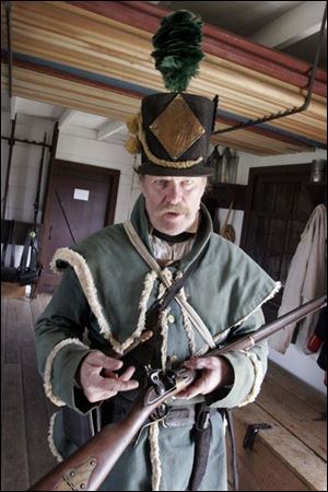 nbrw history10 4/5/2008 blade photo by herral long   Tony Szymanski of holland oh expalins his flintlock   _____________ Hands on History Saturday at Fort Meigs ? April 5, 2008 After a long winter, Fort Meigs? gates are re-opened. Help us kick-off the 2008 season with a ?bang? as we present A Soldier?s Life, a Hands-on History Saturday program on Saturday, April 5. Witness musket demonstrations and learn about the life of a soldier or camp follower during the War of 1812 by experiencing the activities that soldiers performed on a daily basis like laundry, drilling with the musket, and marching. The program runs from 1:00 - 4:00 p.m. and all activities are included with paid admission. Fort Meigs is open Wednesday through Saturday from 9:30 am to 5:00 pm and Sundays Noon to 5:00 pm. Admission is $7- Adults; $6- Seniors, $3- Students; Free- Five and under. Fort Meigs, one of 60 Ohio Historical Society sites, is located one mile west of Perrysburg, Ohio on State Route 65. For further information call the fort at 800-283-8916 or visit us on-line at www.fortmeigs.org