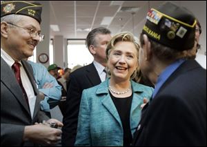Democratic presidential hopeful Sen. Hillary Rodham Clinton, D-N.Y., greets veterans during a campaign stop in at Hot Metal Diner in West Mifflin, Pa., on Thursday. 