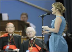 Kelly Clarkson sings the Ave Maria for Pope Benedict XVI during a youth rally on Saturday at St. Joseph's Seminary in Yonkers, N.Y. 
