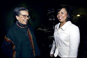 Marian Wright Edelman, left, author and founder and president
of the Children s Defense Fund, meets with Tracee Perryman-
Stewart before speaking to an audience of nearly 700.
