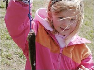 nbrw trout01p        4/26/2008    blade photo by herral long   Lydia Yoder 6  of Delta holds her catch       fishermen, will circle around the shores of Olander Lake for the Olander Park System's annual fishing derby day. Please get several photos for photo package for West; event draws youngsters from across area and we can run photos in other sections as well if you happen upon families such as from South Toledo area, East, etc. Michigan kids could be there as well. ___________