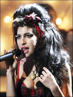 Amy Winehouse performs at the Brit Awards 2008 in London.