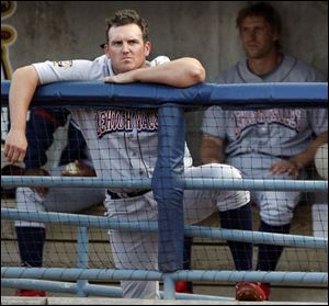 Bowling Green native Andy Tracy watches from the Lehigh Valley
dugout last night at Fifth Third Field.
