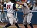 The Hens' Brent Clevlen beats a pickoff attempt as Lehigh Valley first baseman Andy Tracy waits for the throw. Tracy, who starred at Bowling Green High and BGSU, leads the team in homers with six.