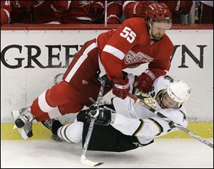 Red Wings defenseman Niklas Kronwall (55) checks Stars
center Mike Ribeiro in the second period.