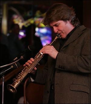 Jazz musician Tim Ries plays his soprano saxophone. He is working with the Rolling Stones on his new disc.