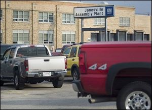 The General Motors Janesville assembly plant on Tuesday in Janesville, Wis. GM announced Tuesday that four GM truck and SUV plants will close including this plant, which opened in 1919.
