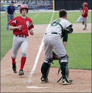 Central Catholic s Cory Lehman scores as Start catcher Kyle Maran waits for the ball in yesterday s City League semi-finals. The Irish won 9-3 to reach tomorrow s final against St. Francis, a 7-2 winner over Clay. 