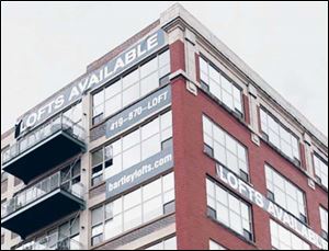 Almost half the 52-unit Bartley Lofts project is unsold nearly three years after completion. Condos have been
viewed as a key component of downtown revitalization.