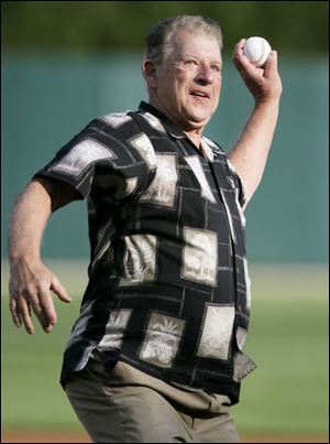 Mickey Lolich, who won three games, including the deciding game, in the 1968 World Series, threw out the ceremonial first pitch in last night's game between the Tigers and Cardinals.
