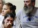 Family and friends of Corey S. Flugga watch in Findlay Municipal Court. 