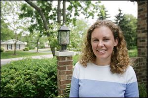 Andrea Messmer, 31, is visiting her parents in Ottawa Hills on a 12-day vacation from her Peace Corps work in Cambodia.
