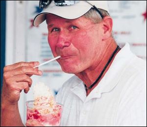 Dale Miller digs into a huge strawberry shortcake sundae at
Cindee Shivers.