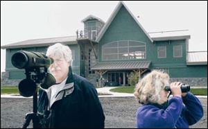 Visitors drawn to the Ottawa National Wildlife Refuge have included Olympia, Wash. s Tom Schooley and Sheila McCartan.