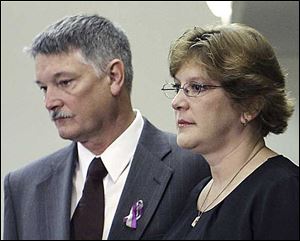 From left, Barry and Lynn Mesley, parents of James Hausman who was injured in the crash, take part in a news conference, Tuesday, July 8, 2008, before a meeting of the National Transportation Safety Board.<br>
<img src=http://www.toledoblade.com/graphics/icons/video.gif> <b><font color=red>VIEW</b></font color=red>: <a href=http://www.ntsb.gov/events/boardmeeting.htm#><b> Bluffton University bus crash NTSB news conference </b></a> (Click on live webcast under more information at top of page) 