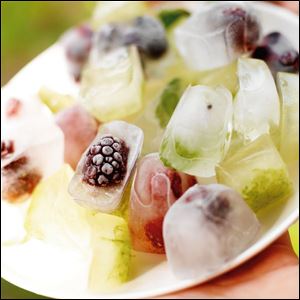 Berries are frozen into ice cubes.