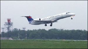 An Embraer ERJ-135 takes off. After Sept. 2 all Delta flights will be gone, leaving Toledo Express with just three carriers.