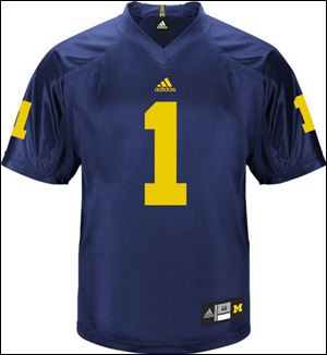 Michigan's new football jerseys sport the adidas logo to replace the Nike swoosh. The university signed an eightyear contract with adidas last year. The Wolverines' contract includes uniforms, shoes and equipment for all of its 25 teams. The white road jerseys will feature a prominent stripe.