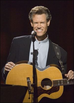 Randy Travis plans to make gospel and country albums.