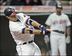 Kelly Shoppach blasts a solo home run for the Indians off Tigers starter Kenny Rogers in the sixth inning last night.