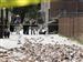 Moderate-California-quake-a-drill-for-the-Big-One.jpg People stand in an alleyway behind police tape near where bricks fell from an unoccupied building during an earthquake Tuesday in Pomona, Calf., near Los Angeles.