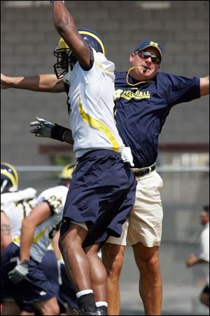 Michigan s Rich Rodriguez had a good time at his first practice.
