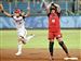 Japan-ends-U-S-domination-in-softball.jpg Japan's Eri Yamada celebrates as Victoria Galindo stands stunned on second base after the Americans lost a softball game for the first time since Sept. 21, 2000, at the Sydney Games.