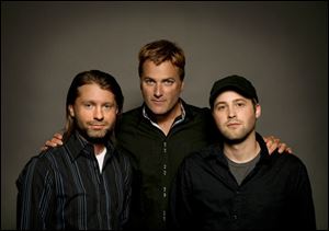 Mark Cowart, left, Michael W. Smith, and Ryan Smith are founders of Seaborne Pictures, a Christian movie company.